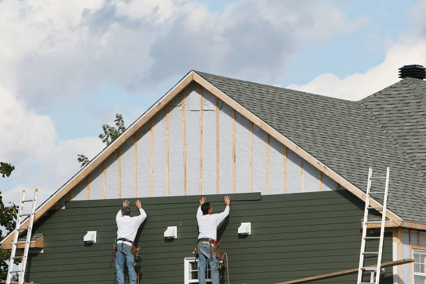 Professional Siding technician working in Canton, GA